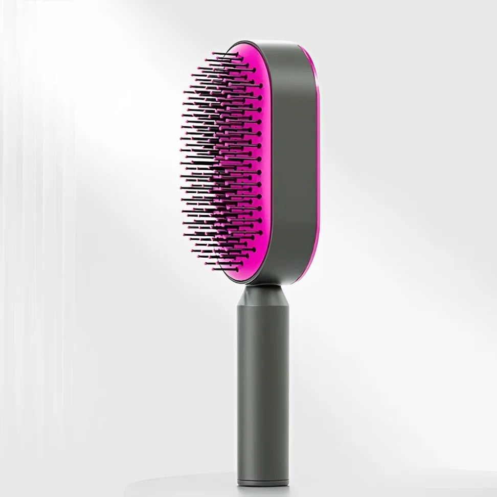 Minimalistische selbstreinigende Haarbürste in Schwaz-pink mit ergonomischem Griff und flexiblen Borsten – modernes Beauty-Tool zum schmerzfreien Entwirren und täglichen Styling für alle Haartypen.