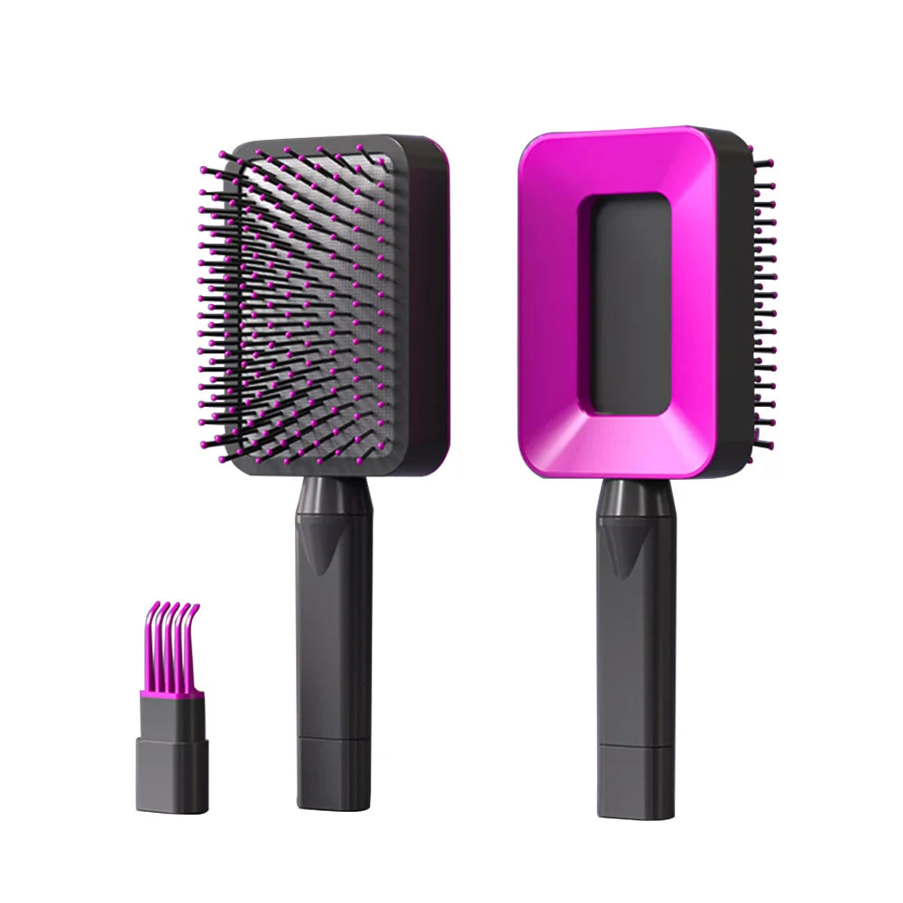 Selbstreinigende Massage-Haarbürsten in Dunkelgrau/Schwarz mit pinken Akzenten und pinken Borsten – manuelle Entwirrungsbürsten mit ergonomischem Griff und integriertem Reinigungskamm zur einfachen Entfernung von Haaren aus der Bürste.